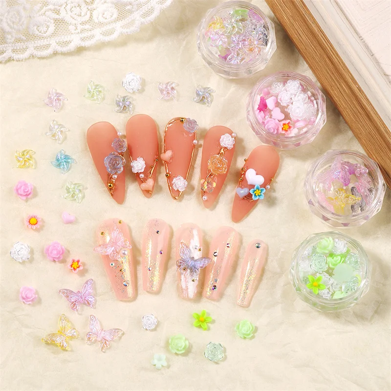 One Box Japanese Nail Decorations Mixed Aurora Glitter Camellia Butterfly Love Nail Art Jewelry Charms 3D Resin Nail Rhinestones
One Box Japanese Nail Decorations Mixed Aurora Glitter Camellia Butterfly Love Nail Art Jewelry Charms 3D Resin Nail Rhinestones
