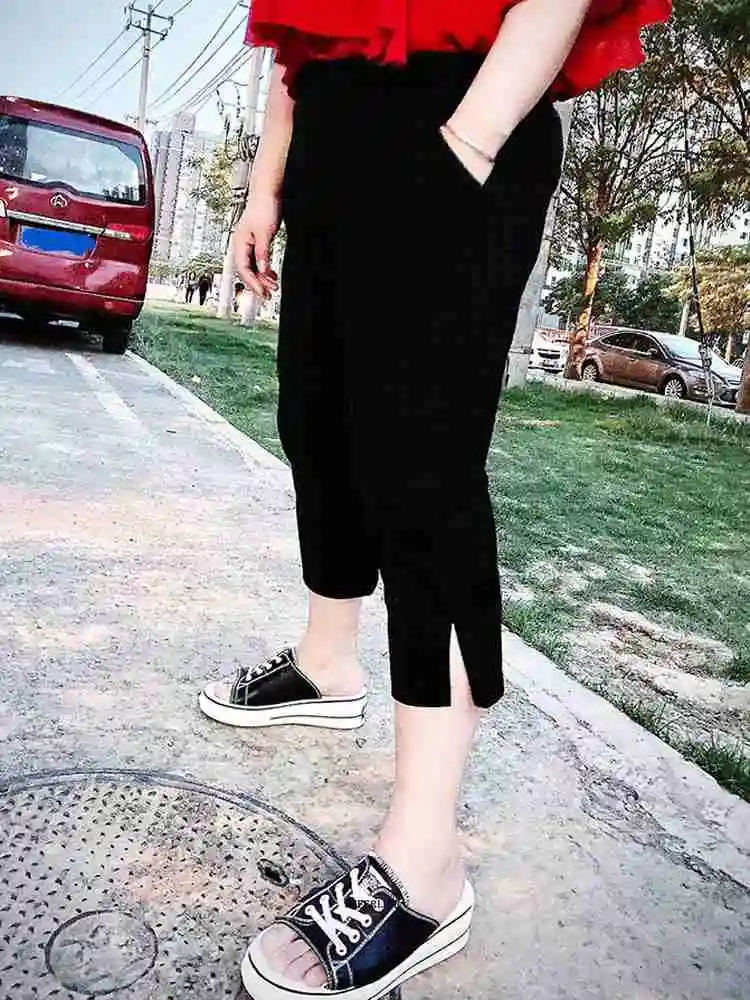 Large Size 6XL 150kg Women Harem Pants Summer Split Black Trousers High Elasticity Waist Casual Calf-length Trousers
Large Size 6XL 150kg Women Harem Pants Summer Split Black Trousers High Elasticity Waist Casual Calf-length Trousers