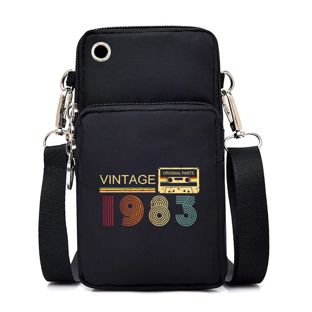 Universal Canvas Waterproof Mobile Phone Bag Vintage 1983 Purses and Handbags Retro Radio Print Messenger Bag for Women Men
Universal Canvas Waterproof Mobile Phone Bag Vintage 1983 Purses and Handbags Retro Radio Print Messenger Bag for Women Men