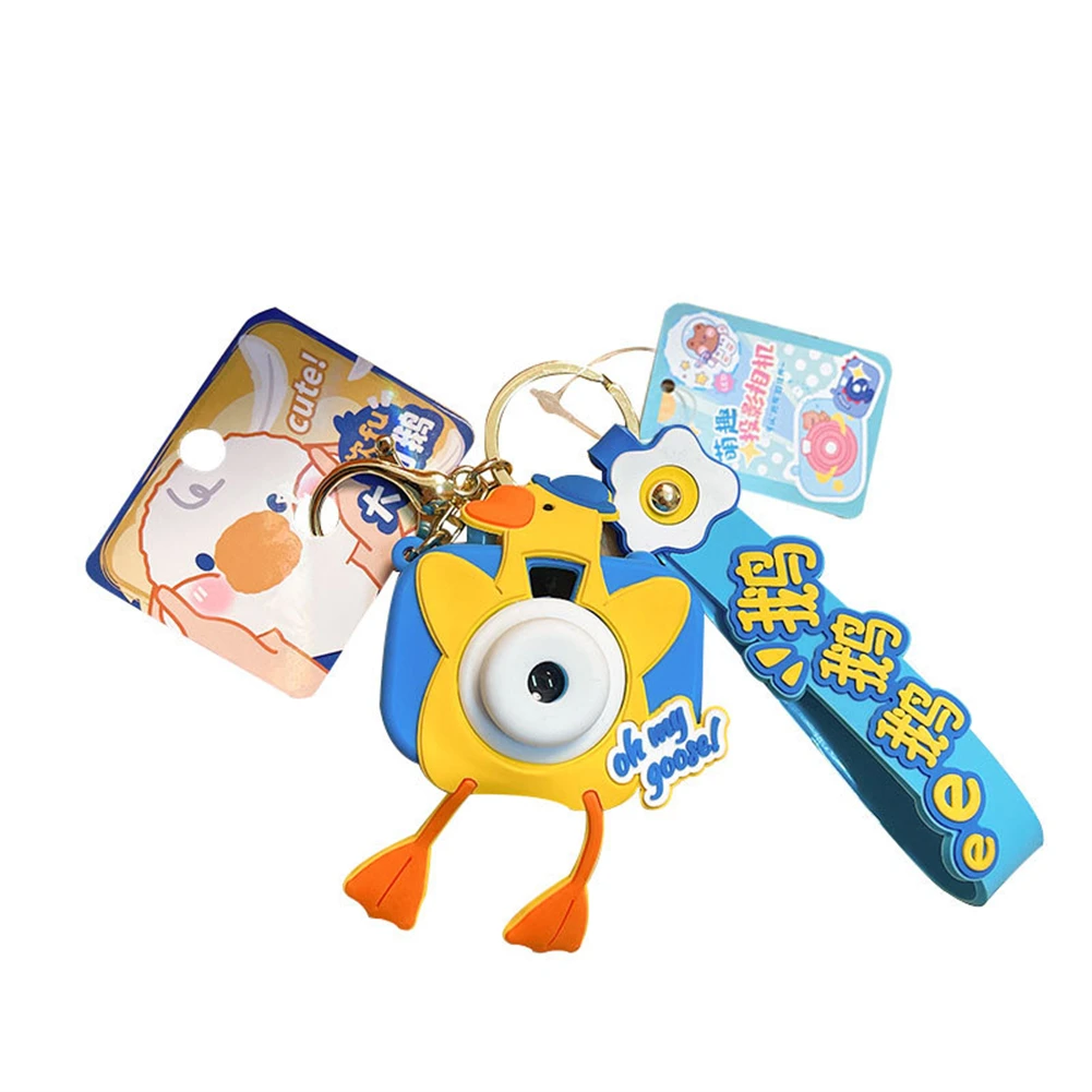 Cartoon White Goose Projection Camera Creative Bag Toy Pendant Gift Wholesale Car Keychain
Cartoon White Goose Projection Camera Creative Bag Toy Pendant Gift Wholesale Car Keychain