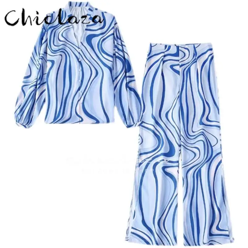 CHICLAZA 2022 Summer Women Fashion Blend Printed Shirt + Split Wide Leg Pants Suit Female Casual V neck High Waist Trousers Set 
CHICLAZA 2022 Summer Women Fashion Blend Printed Shirt + Split Wide Leg Pants Suit Female Casual V neck High Waist Trousers Set