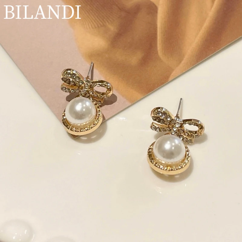 Mihan S925 needle Sweet Jewelry Bow Earrings Pretty Design High Quality Shiny Crystal Simulated Pearl Drop Earrings For Women
Mihan S925 needle Sweet Jewelry Bow Earrings Pretty Design High Quality Shiny Crystal Simulated Pearl Drop Earrings For Women