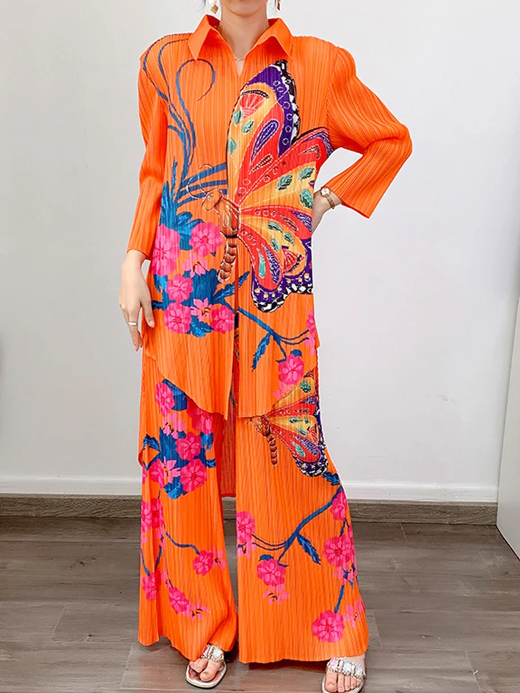 Miyake Flap Neck Long Sleeve Butterfly Print Women Fashion Top + Pleated Loose Style Plus Size Casual Design Wide Leg Trousers 
Miyake Flap Neck Long Sleeve Butterfly Print Women Fashion Top + Pleated Loose Style Plus Size Casual Design Wide Leg Trousers