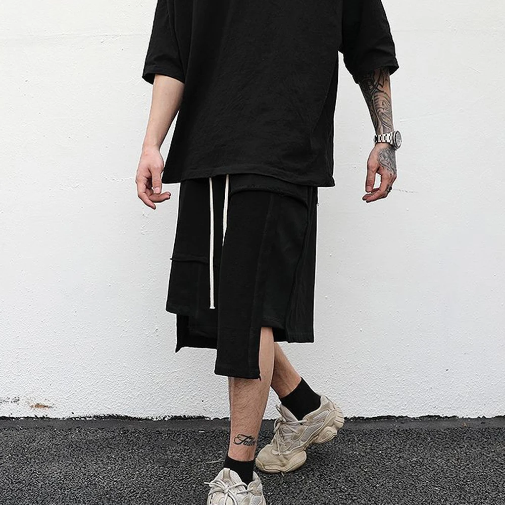 2023 Men's Breeches Irregular Patchwork High Street Sports Half Shorts Korean Fashion Loose Wide Leg Short Pant Y2k Clothes 2023
2023 Men's Breeches Irregular Patchwork High Street Sports Half Shorts Korean Fashion Loose Wide Leg Short Pant Y2k Clothes 2023