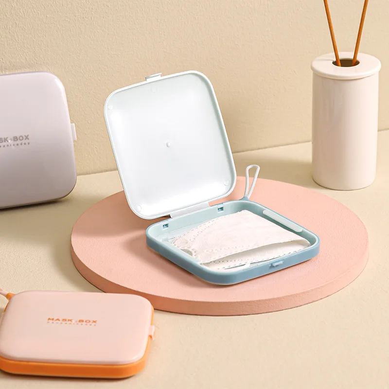 Square Mask Box New Creative Portable Dust Mask Storage Box Anti-fouling Lift Lid Plastic Temporary Storage Clip 
Square Mask Box New Creative Portable Dust Mask Storage Box Anti-fouling Lift Lid Plastic Temporary Storage Clip