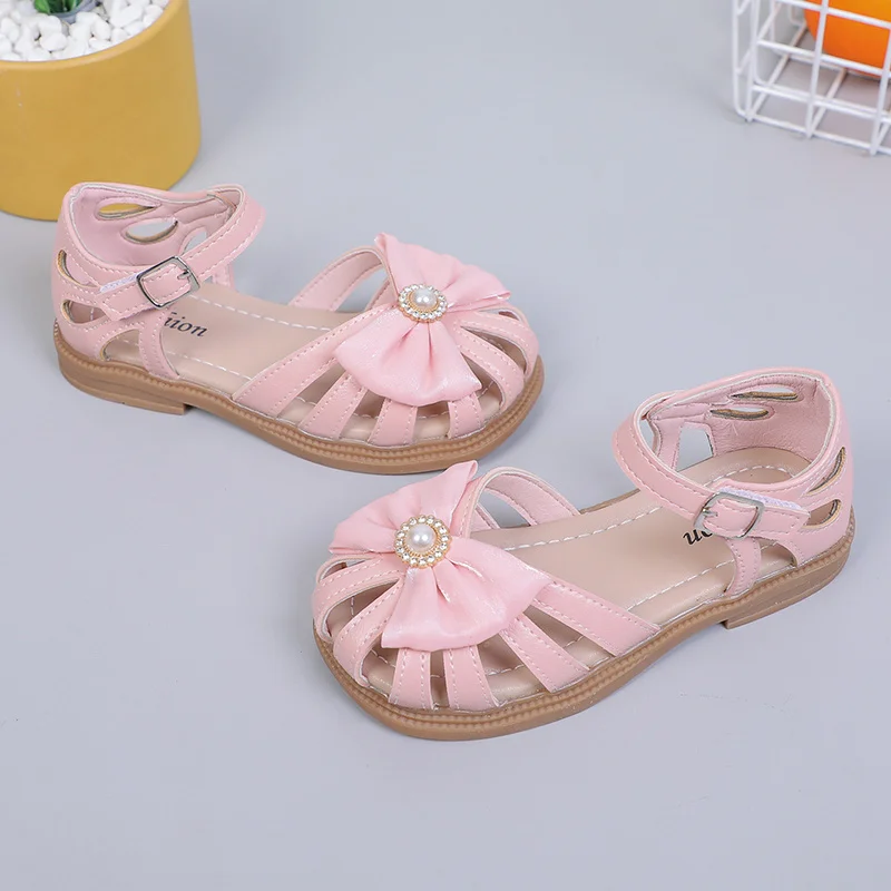 Girls Sandals 2022 Summer New PU Princess Hollow Covered Toes Kids Fashion Bow with Big Pearl Soft Simple Children Casual Shoes
Girls Sandals 2022 Summer New PU Princess Hollow Covered Toes Kids Fashion Bow with Big Pearl Soft Simple Children Casual Shoes