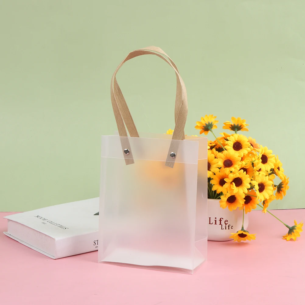 Semi Transparent PVC Frosted PP Handbag Christmas Gift Packing Candy Gift Bag Souvenir Flower New Year Gift Bag
Semi Transparent PVC Frosted PP Handbag Christmas Gift Packing Candy Gift Bag Souvenir Flower New Year Gift Bag