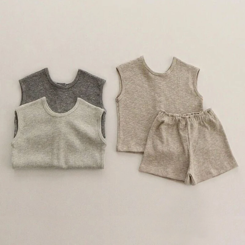 Toddler Summer Children's Suit Boys Sleeveless Vest Top Boys and Girls Waffle Breathable Shorts Vest Two Piece Suit
Toddler Summer Children's Suit Boys Sleeveless Vest Top Boys and Girls Waffle Breathable Shorts Vest Two Piece Suit
