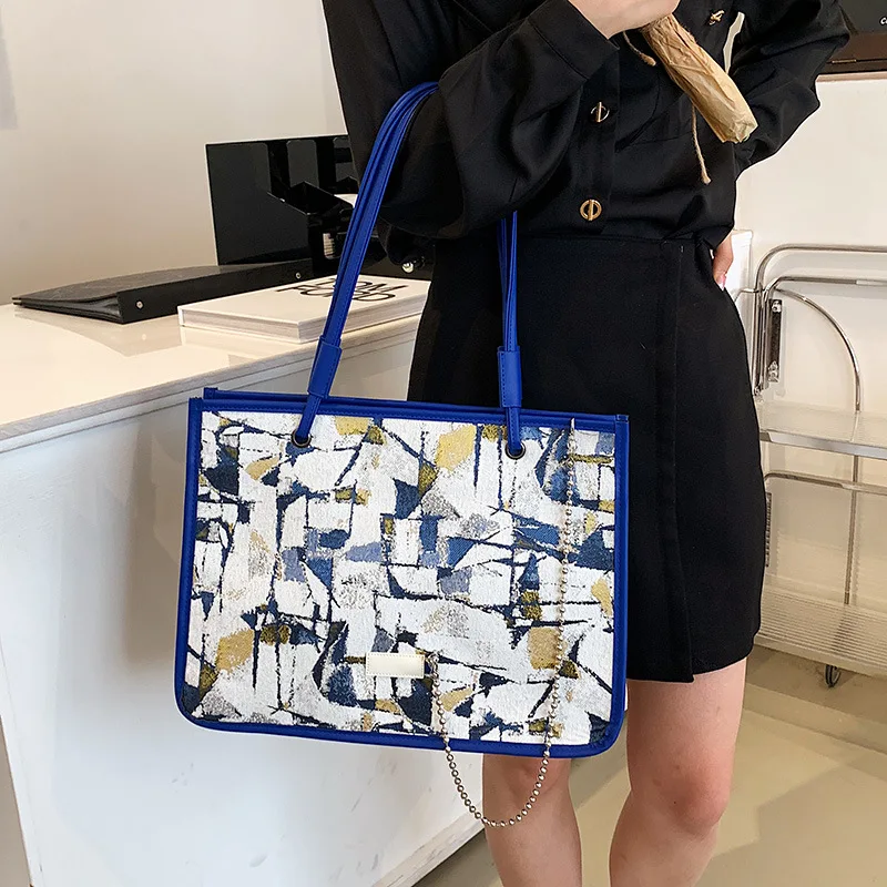 

Новая роскошная клетчатая женская сумка на одно плечо с масляной живописью, модель 2023 года, Корейская версия нишевого дизайна, модная сумка-...