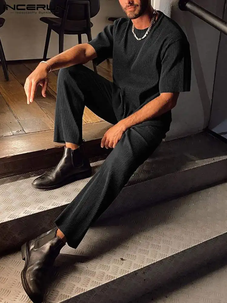 INCERUN Men Sets Solid Color Streetwear Folds O-neck Short Sleeve T Shirt & Long Pants Two Pieces Sets 2022 Men Casual Suits 5XL
INCERUN Men Sets Solid Color Streetwear Folds O-neck Short Sleeve T Shirt & Long Pants Two Pieces Sets 2022 Men Casual Suits 5XL