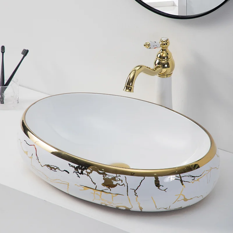 Hotel luxury golden oval vanity vessel sink bowl white and riche gold plated hand wash ceramic basin for bathroom
Hotel luxury golden oval vanity vessel sink bowl white and riche gold plated hand wash ceramic basin for bathroom