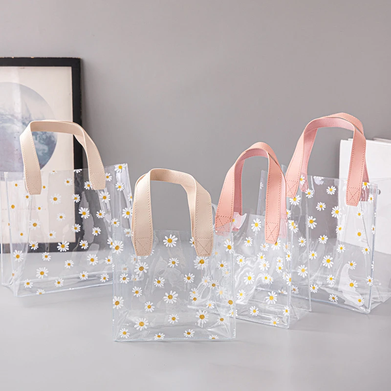 1PC Gift Bag PVC Transparent Gift Tote Bags Daisy Packaging Bag Ins Wedding Favor for Guests Party Supplies Candy Box
1PC Gift Bag PVC Transparent Gift Tote Bags Daisy Packaging Bag Ins Wedding Favor for Guests Party Supplies Candy Box