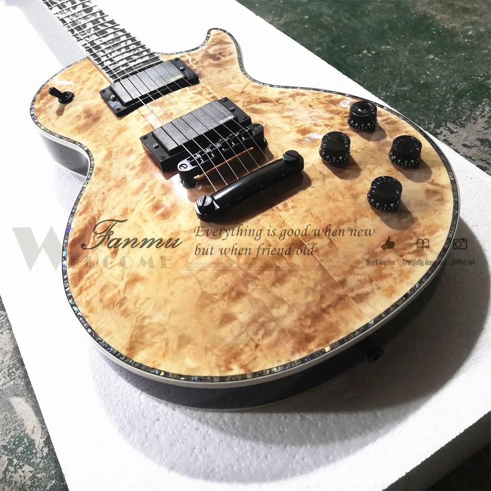 Classic 6-string electric guitar, mahogany body squilted veneer, colored shell binding, flame inlay on the fretboard, black
Classic 6-string electric guitar, mahogany body squilted veneer, colored shell binding, flame inlay on the fretboard, black