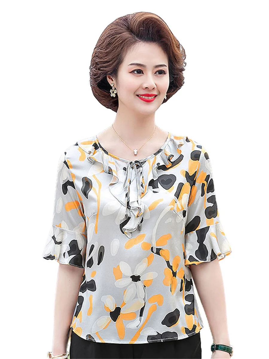 5XL Women Summer Spring Blouses Shirts Lady Fashion Casual Short Sleeve O-Neck Collar Ruffles Flower Printing Blusas Tops B6005
5XL Women Summer Spring Blouses Shirts Lady Fashion Casual Short Sleeve O-Neck Collar Ruffles Flower Printing Blusas Tops B6005