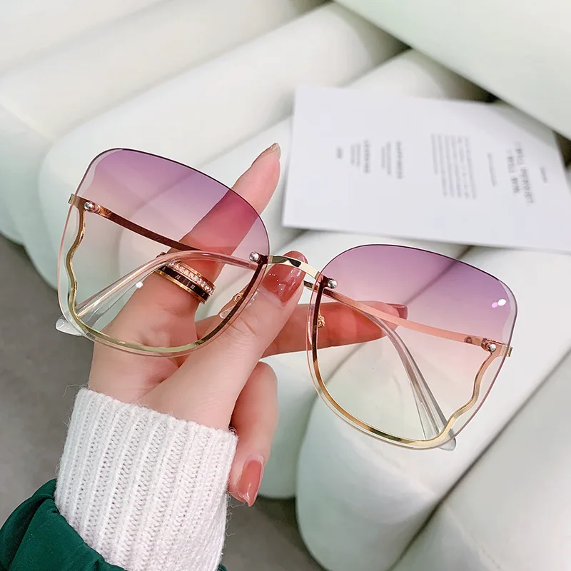 New Fashion Rimless Sunglasses Women Luxury Brand Design Cat Eye Sun Glasses Ladies Gradient Sunglass 2022 Diamond Cutting Lenes
New Fashion Rimless Sunglasses Women Luxury Brand Design Cat Eye Sun Glasses Ladies Gradient Sunglass 2022 Diamond Cutting Lenes