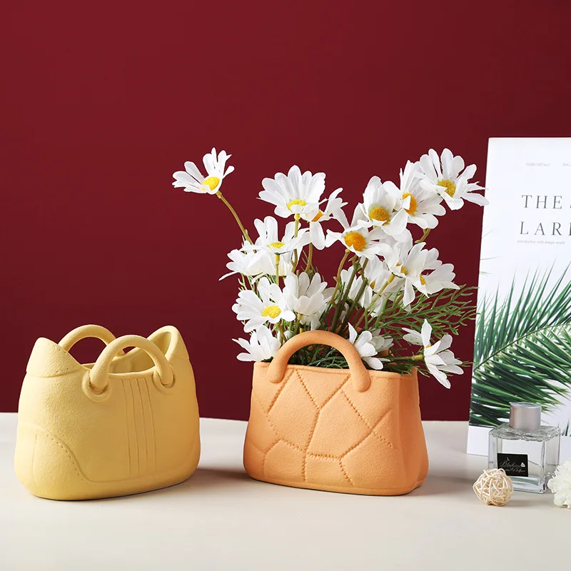 Creative Handbag Vase Mini Ceramic Vase Nordic Home Living Room Decoration Pots For Plants Flower Pot Decorative Vases Modern
Creative Handbag Vase Mini Ceramic Vase Nordic Home Living Room Decoration Pots For Plants Flower Pot Decorative Vases Modern