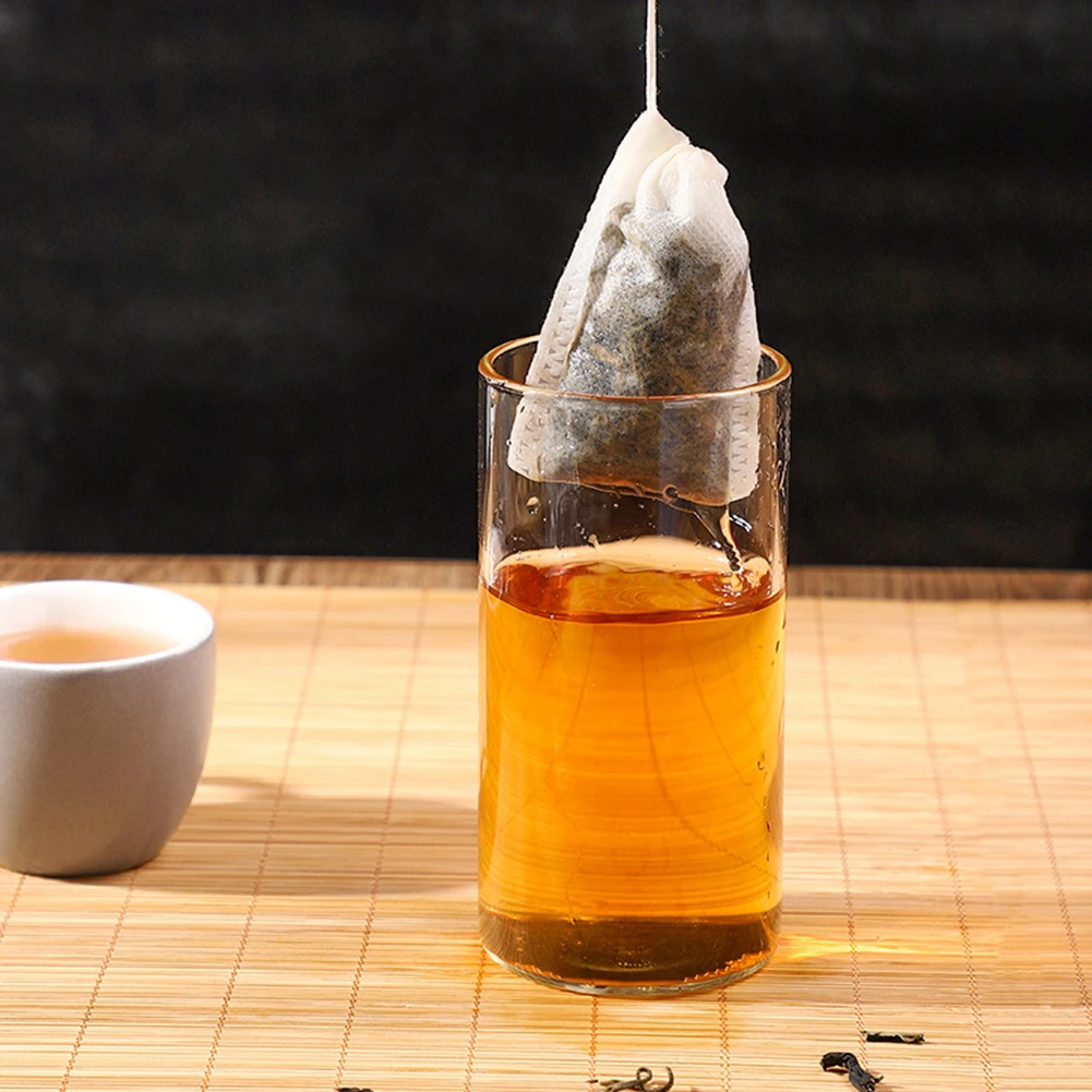 100Pcs/lot Disposable Tea Bags Empty Tea Bag With String Heal Seal Filter Paper For Herb Teabags For Loose Tea
100Pcs/lot Disposable Tea Bags Empty Tea Bag With String Heal Seal Filter Paper For Herb Teabags For Loose Tea