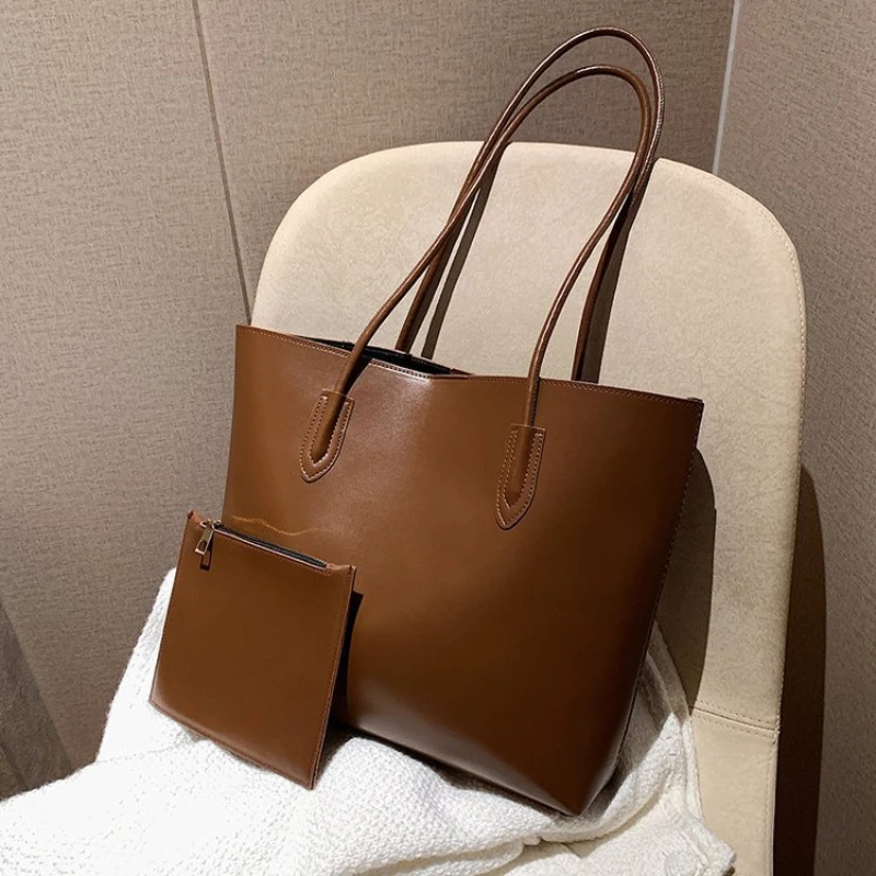 Large Bag Large Capacity Tote Son and Mother Bag New Female Bag Simple Air Hand Bill of Lading Shoulder Bag
Large Bag Large Capacity Tote Son and Mother Bag New Female Bag Simple Air Hand Bill of Lading Shoulder Bag
