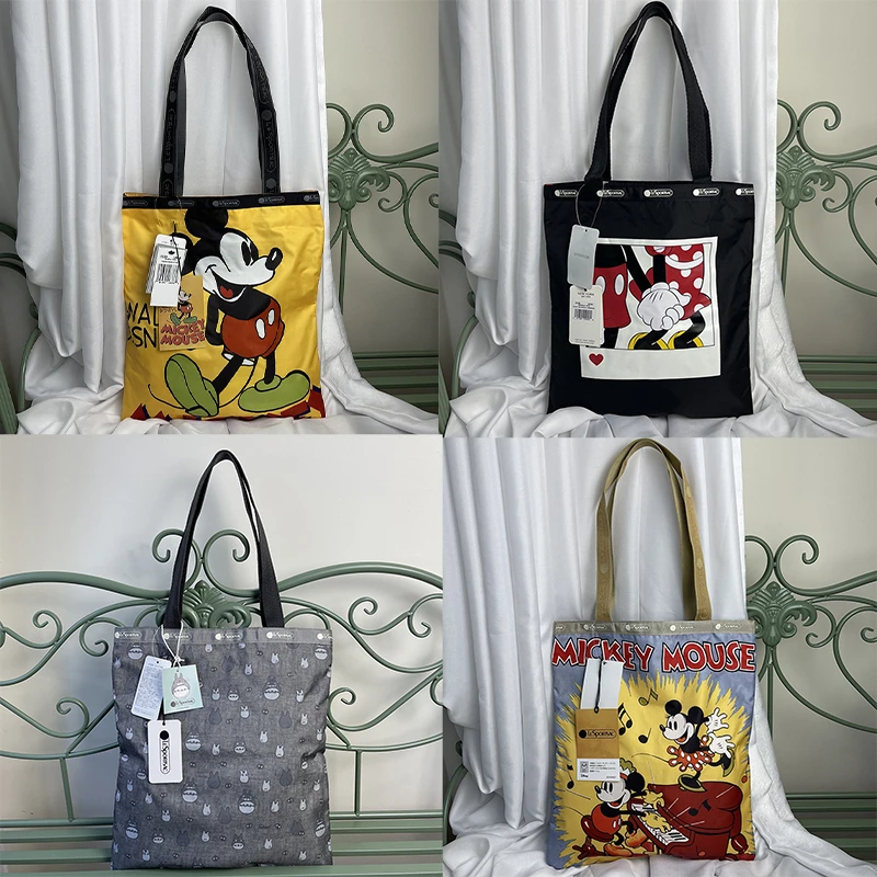 Lesportsac Kawaii Женская тканевая сумка парашют водонепроницаемая ткань Повседневная мультяшная печать модная сумка-тоут ручная сумка через плеч...
Lesportsac Kawaii Женская тканевая сумка парашют водонепроницаемая ткань Повседневная мультяшная печать модная сумка-тоут ручная сумка через плеч...