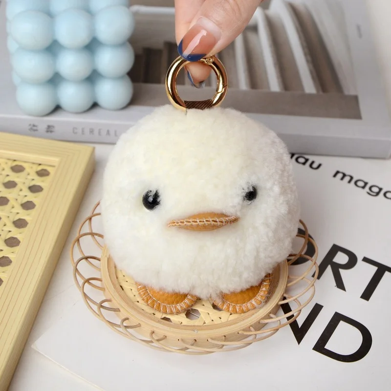 Румяна маленькая Желтая утка подвеска из натуральной шерсти женский брелок для ключей Симпатичный Брелок с помпоном для автомобиля плюшев...
Румяна маленькая Желтая утка подвеска из натуральной шерсти женский брелок для ключей Симпатичный Брелок с помпоном для автомобиля плюшев...
