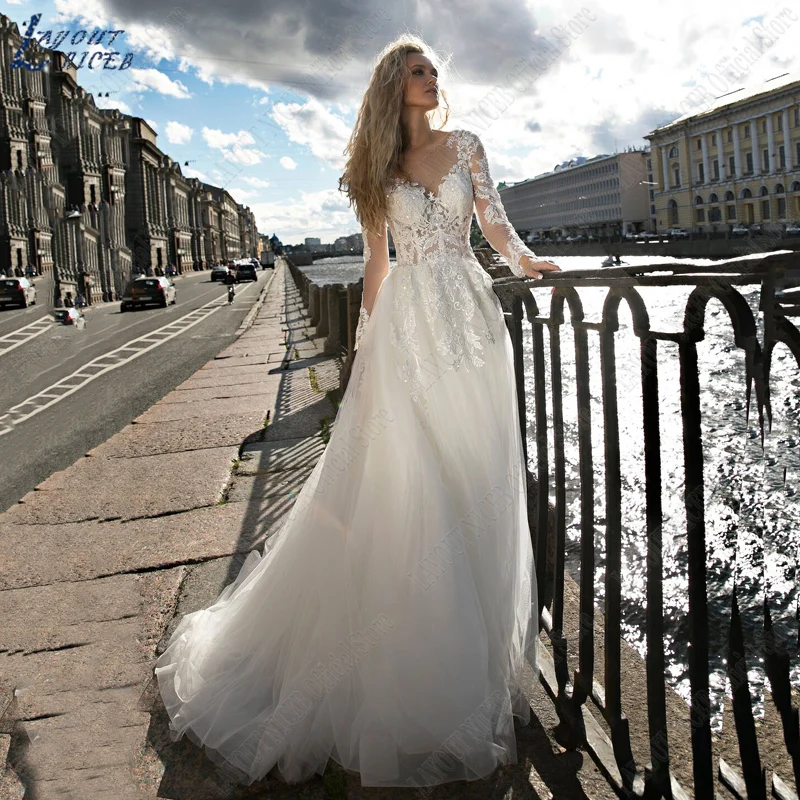 LAYOUT NICEB Wedding Dresses Long Sleeves Beach Vestido De Noiva Illusion O-Neck Lace Appliques Elegant A Line Bridal Gown Tulle
LAYOUT NICEB Wedding Dresses Long Sleeves Beach Vestido De Noiva Illusion O-Neck Lace Appliques Elegant A Line Bridal Gown Tulle