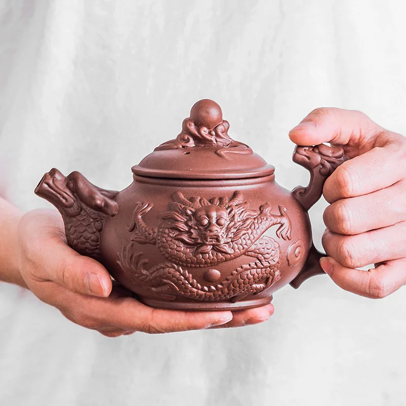 Teapot Commercial Tea Set Ceramic Tea Cup Household Set Yixing Purple Clay Kettle Drinking Kettle Bubble Camellia Teapot
Teapot Commercial Tea Set Ceramic Tea Cup Household Set Yixing Purple Clay Kettle Drinking Kettle Bubble Camellia Teapot