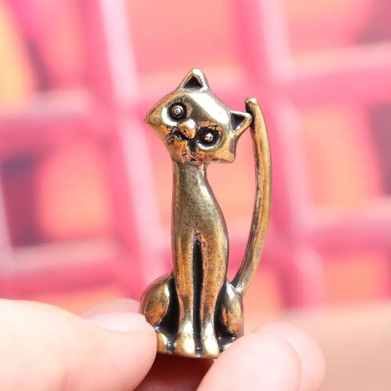 Латунная статуэтка кошки
Латунная статуэтка кошки