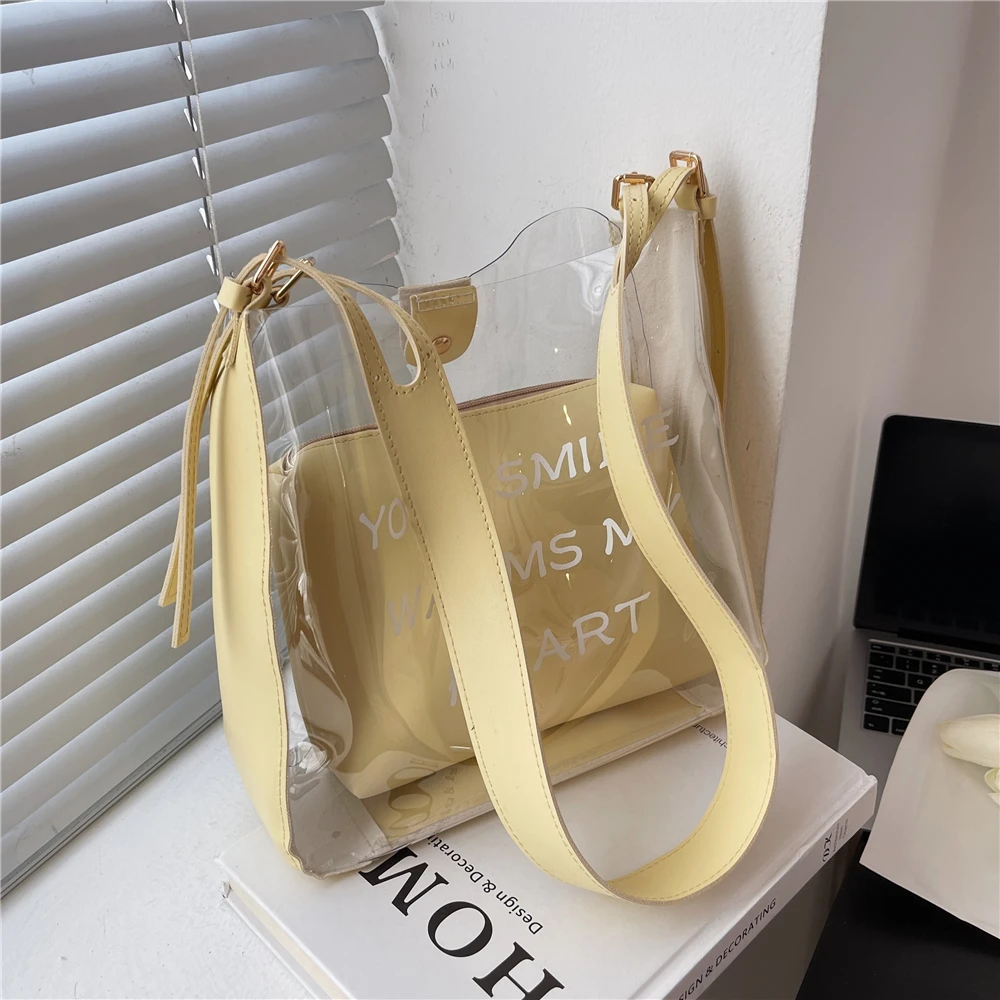 2022 Summer Wide Strap Bucket Transparent Shoulder Crossbody Bags For Women Designer Brand Trendy 2 Pcs/Set Clear Jelly Handbags
2022 Summer Wide Strap Bucket Transparent Shoulder Crossbody Bags For Women Designer Brand Trendy 2 Pcs/Set Clear Jelly Handbags