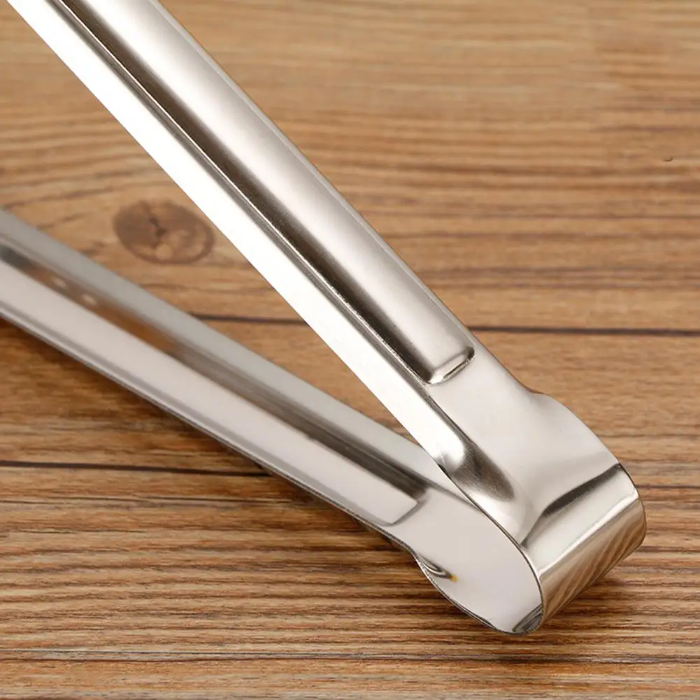 Stainless Steel Kitchen Tong Sugar Ice Cube Tongs Tea Party Bar Tools Heat Resistant Hollow-Out Tongs BBQ Kitchen Accessories
Stainless Steel Kitchen Tong Sugar Ice Cube Tongs Tea Party Bar Tools Heat Resistant Hollow-Out Tongs BBQ Kitchen Accessories