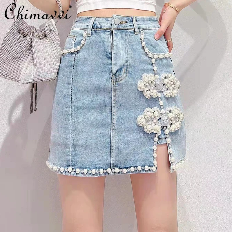 Ladies 2022 Summer New Korean Style Sweet Beads Flower Slit Denim Skirt Women Fairy Simple High Waist Slimming Above Knee Skirt
Ladies 2022 Summer New Korean Style Sweet Beads Flower Slit Denim Skirt Women Fairy Simple High Waist Slimming Above Knee Skirt