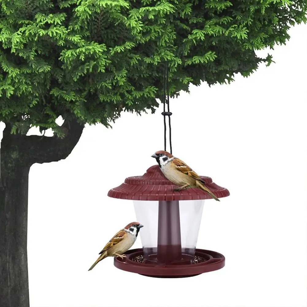 Outdoor Bird Feeder Transparent Plastic Hanging Bird Feeder Bird Supplies Pet Outdoor Feeding Device 
Outdoor Bird Feeder Transparent Plastic Hanging Bird Feeder Bird Supplies Pet Outdoor Feeding Device
