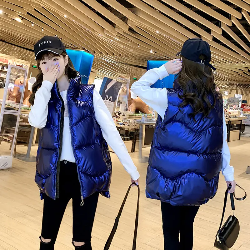 New Women Winter Bright Vests Hooded Thick Short Vest Waterproof Cotton Padded Sleeveless Coat Female Waterproof Waistcoat N30
New Women Winter Bright Vests Hooded Thick Short Vest Waterproof Cotton Padded Sleeveless Coat Female Waterproof Waistcoat N30