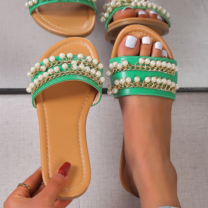 Pearl Metal Chain Flat Sandals Women Summer 2023 Roman Style Beach Slippers Woman Plus Size 42 Heeled Slides Flip-Flops Female
Pearl Metal Chain Flat Sandals Women Summer 2023 Roman Style Beach Slippers Woman Plus Size 42 Heeled Slides Flip-Flops Female