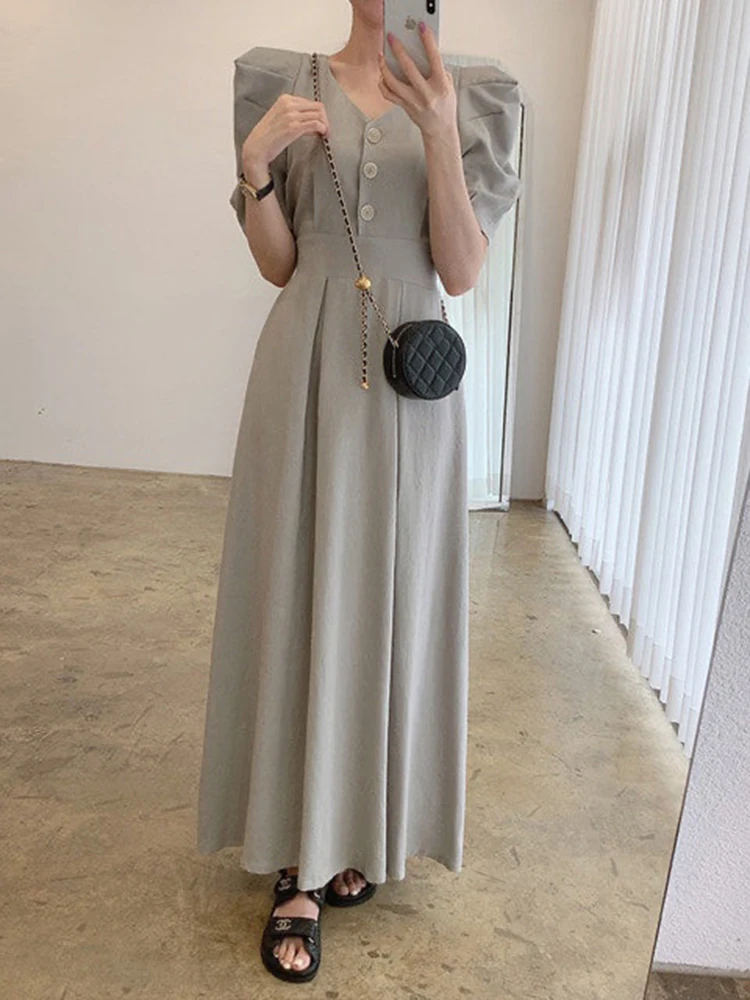 Women 2022 Spring Korean Elegant V-neck Single-breasted Design Slim Fit and Slim Puff Sleeve Long Dress Vestidos Female D0929
Women 2022 Spring Korean Elegant V-neck Single-breasted Design Slim Fit and Slim Puff Sleeve Long Dress Vestidos Female D0929