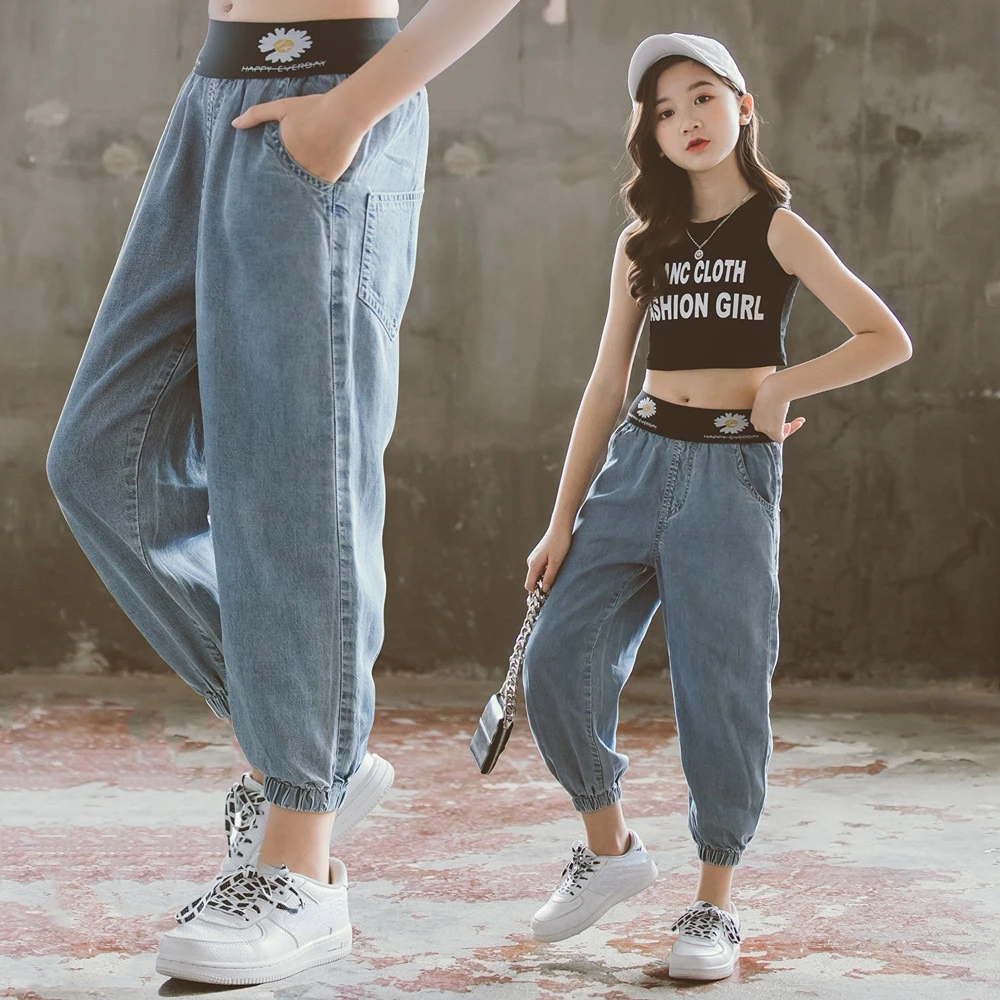 Джинсы для девочек весна-осень шелковые укороченные брюки свободные брюки с защитой от комаров тонкие модные детские летние шелковые брюки в Корейском стиле 
Джинсы для девочек весна-осень шелковые укороченные брюки свободные брюки с защитой от комаров тонкие модные детские летние шелковые брюки в Корейском стиле