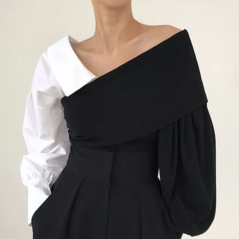 SuperAen Spring French V-neck Splicing Fake Two Irregularly Designed Lantern Sleeve Casual Shirts Women
SuperAen Spring French V-neck Splicing Fake Two Irregularly Designed Lantern Sleeve Casual Shirts Women