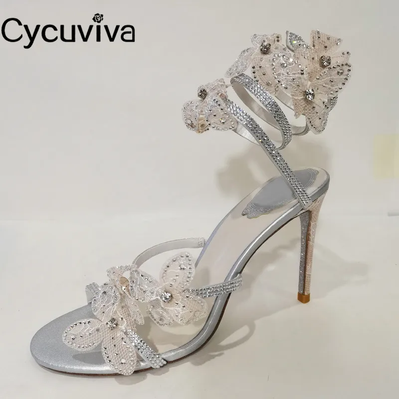 Сандалии женские на тонком каблуке, элегантные босоножки с кружевом, с блестками, цветочным принтом, с ремешком на щиколотке, свадебная обув...
Сандалии женские на тонком каблуке, элегантные босоножки с кружевом, с блестками, цветочным принтом, с ремешком на щиколотке, свадебная обув...