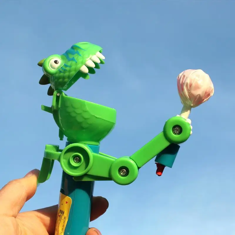 Dinosaur robot lollipop childhood classic funny sand sculpture candy monk lollipop save creative candy toy
Dinosaur robot lollipop childhood classic funny sand sculpture candy monk lollipop save creative candy toy