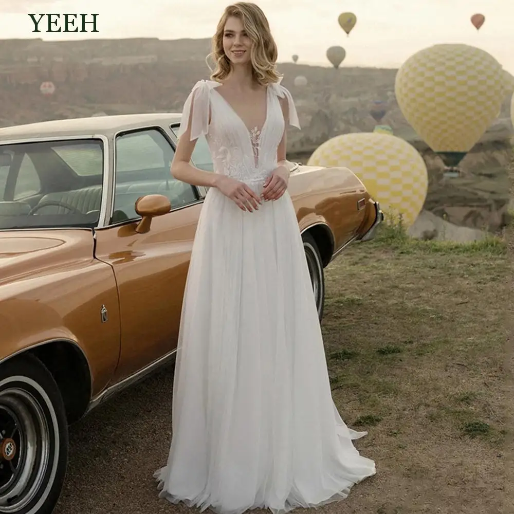 YEEH Beach Boho V-Neck Wedding Dress For Bride 2022 Summer Tank With Bows Robe De Mariée Sexy Lace Backless Vestido De Novia
YEEH Beach Boho V-Neck Wedding Dress For Bride 2022 Summer Tank With Bows Robe De Mariée Sexy Lace Backless Vestido De Novia