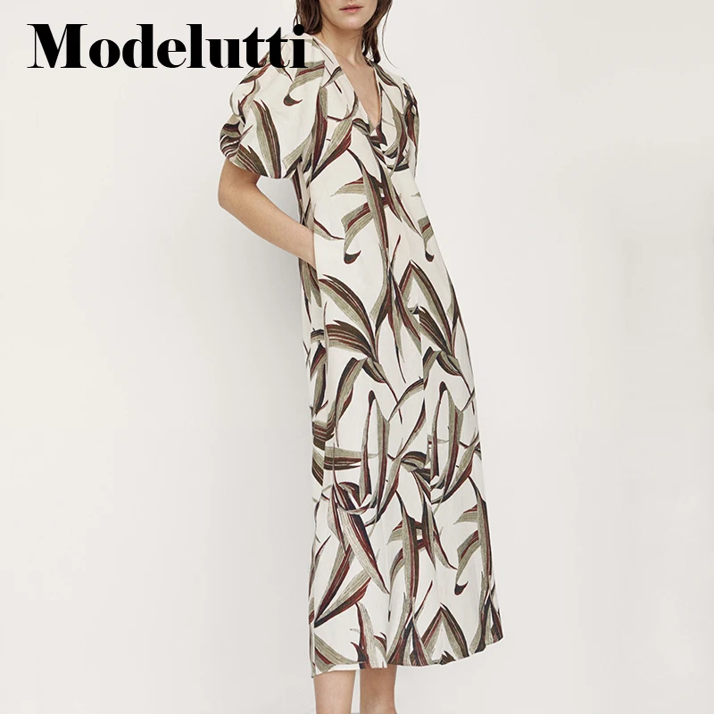 Modelutti 2022 New Summer Fashion Short Sleeve V-neck Leaves Printed Dresses Women Backless Simple Casual Long Dress Female
Modelutti 2022 New Summer Fashion Short Sleeve V-neck Leaves Printed Dresses Women Backless Simple Casual Long Dress Female