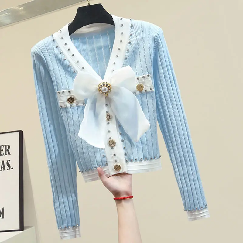 Knitted Cardigan Woman Sweater 2022 New Spring Summer V-Neck Long Sleeve Sweater Sweet Bowknot Cardigans Female Beading Tops F74
Knitted Cardigan Woman Sweater 2022 New Spring Summer V-Neck Long Sleeve Sweater Sweet Bowknot Cardigans Female Beading Tops F74