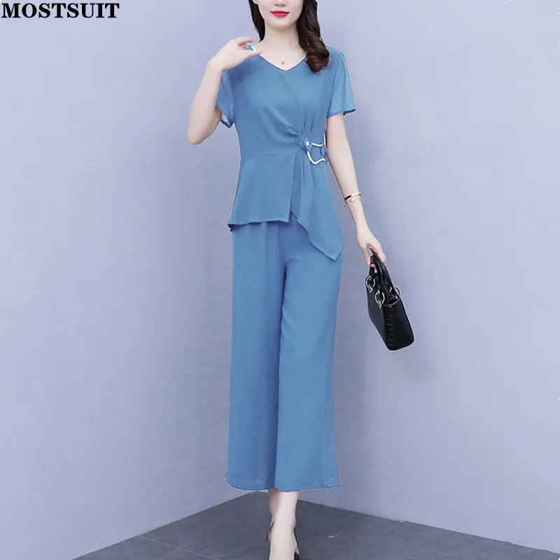 L-5xl Summer Fashion Women 2 Piece Pant Sets Short Sleeve Blouse + Wide Leg Ankle-length Pants Casual Loose Ladies Pant Sets 
L-5xl Summer Fashion Women 2 Piece Pant Sets Short Sleeve Blouse + Wide Leg Ankle-length Pants Casual Loose Ladies Pant Sets