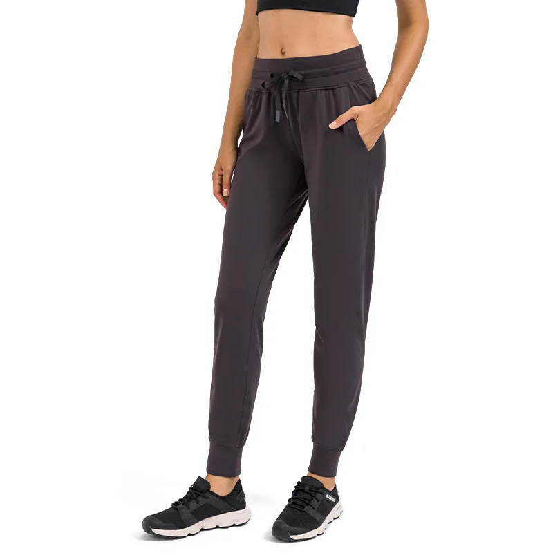 Yoga Leggings Jogging High Waist Fitness Women Sports Pants Casual Running Drawstring Jogging With Pocket Tie Feet Trousers
Yoga Leggings Jogging High Waist Fitness Women Sports Pants Casual Running Drawstring Jogging With Pocket Tie Feet Trousers