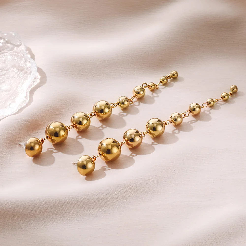 Hot Sale Fashion Personality Gold Ball Beads String Long Tassel Pendant Earrings Classic Noble Temperament Women's Jewelry Gift
Hot Sale Fashion Personality Gold Ball Beads String Long Tassel Pendant Earrings Classic Noble Temperament Women's Jewelry Gift