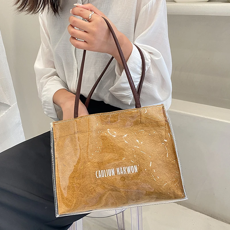 PVC transparent waterproof paper DuPont handbags for women Vintage washed leather tote bag casual shopping Shoulder Bags
PVC transparent waterproof paper DuPont handbags for women Vintage washed leather tote bag casual shopping Shoulder Bags