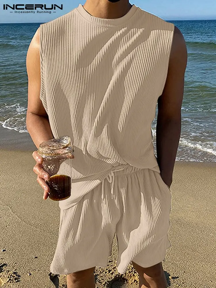 Комплект INCERUN мужской с круглым вырезом, однотонный топ без рукавов и шорты с кулиской, Свободный Повседневный костюм, двойка, лето 2022
Комплект INCERUN мужской с круглым вырезом, однотонный топ без рукавов и шорты с кулиской, Свободный Повседневный костюм, двойка, лето 2022