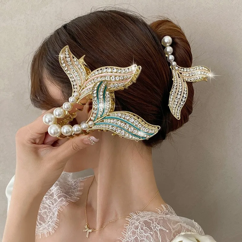 Pearl fish tail plate hair clip Mori series fairy beauty high-end hair clip female back head high-end sense
Pearl fish tail plate hair clip Mori series fairy beauty high-end hair clip female back head high-end sense