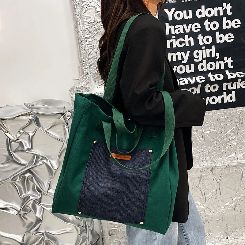 Casual 2022 Women Canvas Tote Bag Female Solid Simple Large Capacity Shoulder Bag Denim Stitching Women Shopper Bags
Casual 2022 Women Canvas Tote Bag Female Solid Simple Large Capacity Shoulder Bag Denim Stitching Women Shopper Bags