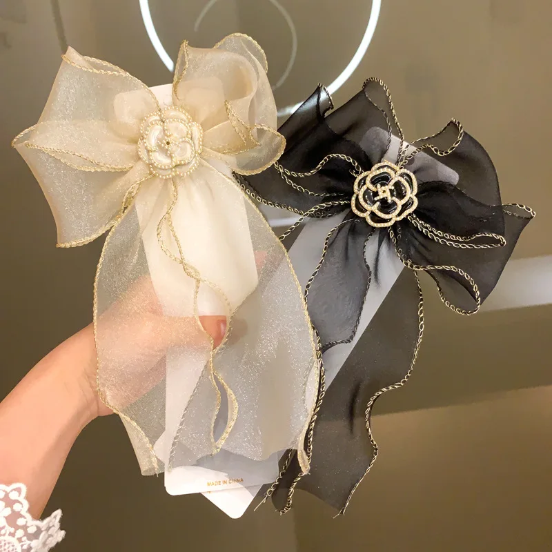 New Cloth Art Pearl Camellia Hairpins Fabric Large Bow Hair Clips for Women Elegant Hairgrip Headdress Korean Hair Accessories
New Cloth Art Pearl Camellia Hairpins Fabric Large Bow Hair Clips for Women Elegant Hairgrip Headdress Korean Hair Accessories