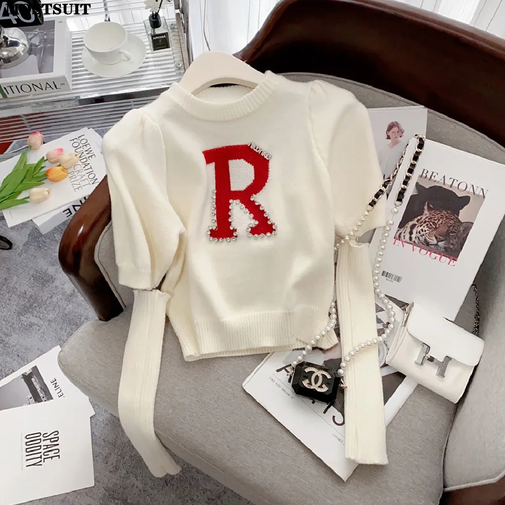 Женский укороченный свитер со стразами, модный шикарный пуловер с рукавами-фонариками и круглым вырезом в уличном стиле, весна 2023 
Женский укороченный свитер со стразами, модный шикарный пуловер с рукавами-фонариками и круглым вырезом в уличном стиле, весна 2023